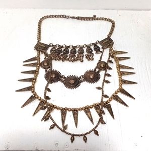 K-5 this 3 strand bronzed toned tribal necklace